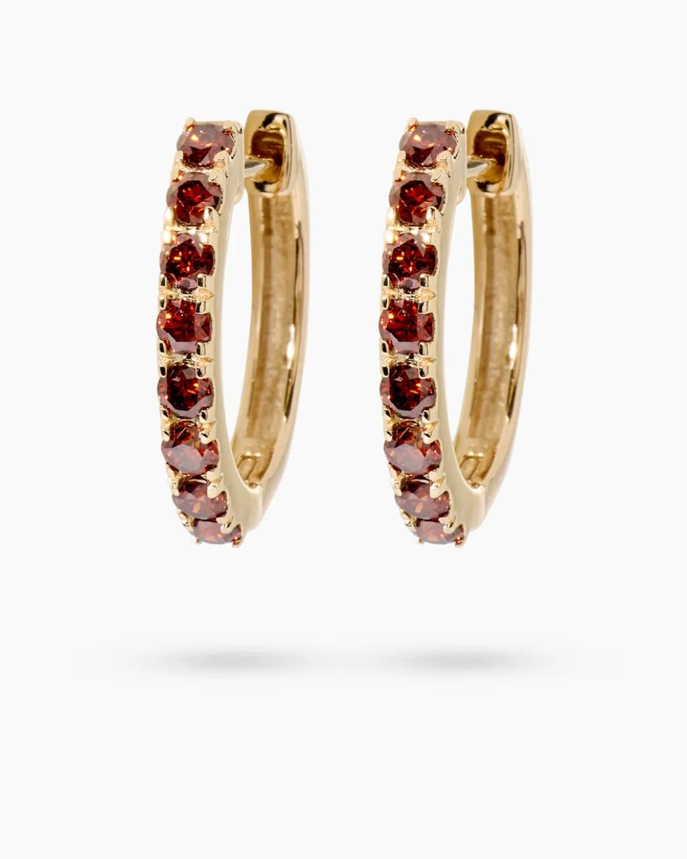 Creolen mit roten Diamanten